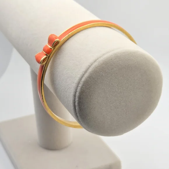 Kate Spade New York Skinny Mini Bow Enamel Bangle - Gold & Coral/Orange - Picture 2 of 14